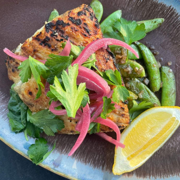 Grilled Halibut with Sugar Snap Peas, Citrus Butter & Herb Salad